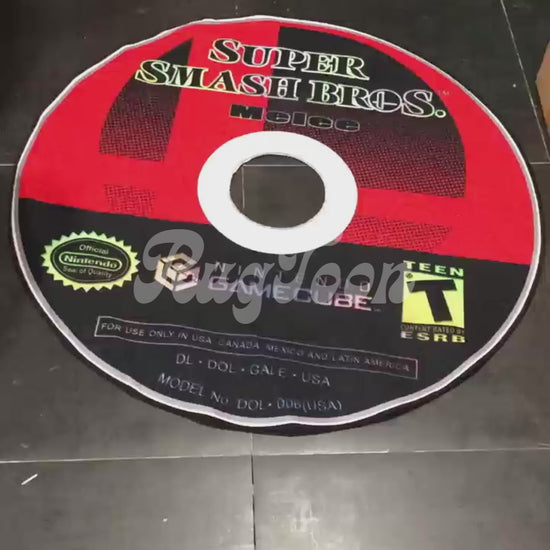 Super Smash Bros Melee rug shaped like a GameCube disc carpet
